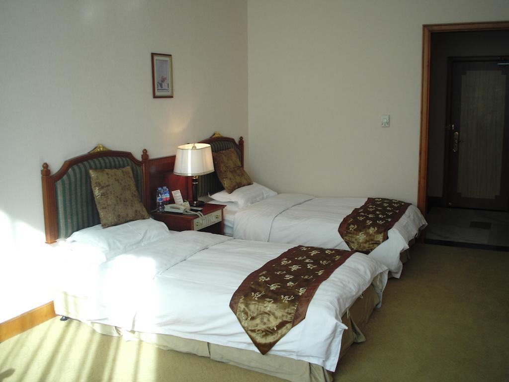 Liaoning Hotel Shenyang Quarto foto